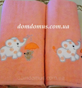 Подарочный набор детских махровых полотенец с оригинальным рисунком в виде слоне. . фото 2