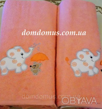Подарочный набор детских махровых полотенец с оригинальным рисунком в виде слоне. . фото 1