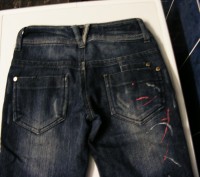 фирменные джинсы,состояние очень хорошее,стильной расцветки,зауженные,стильный п. . фото 3
