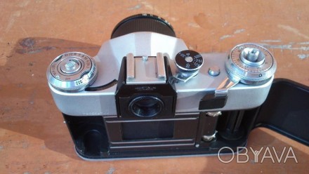 Продам пленочную зеркальную фотокамеру Зенит Е без фотообъектива. Камера рабочая. . фото 1