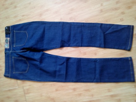 Новые мужские джинсы.Темного цвета,тянуться,замеры:талия 92 см.,длина 105 см. сн. . фото 3