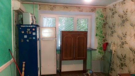 Продается комната в хорошем жилом состоянии на улице Николаевской. Первый этаж п. Ленинский. фото 2