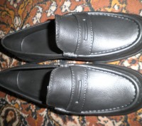 Продам новые калоши-туфли черного цвета.выполнены из материала EVA  цельнолитые,. . фото 2