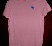 Розовая футболка на 13-14 лет,в отличном состоянии,куплена в США
ABERCROMBIE
з. . фото 2