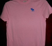 Розовая футболка на 13-14 лет,в отличном состоянии,куплена в США
ABERCROMBIE
з. . фото 3
