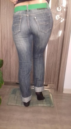 Демисезонные джинсы. 95% коттон, 5% эластан. На бедра 95-100 см. Длина внутренне. . фото 3