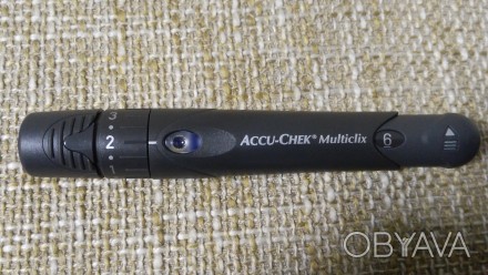 Ручка-прокалыватель Accu-Chek Multiclix - это первое в мире устройство с ланцета. . фото 1