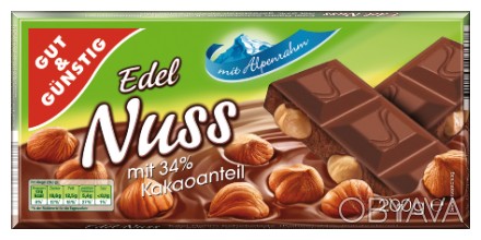 Edel Nuss  - великолепный молочный шоколад (34% какао) с большим содержанием цел. . фото 1