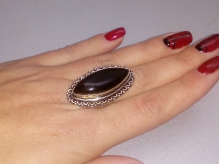 Предлагаем Вам купить красивое кольцо из камня черный оникс.
Размер 18,2.
индийс. . фото 3