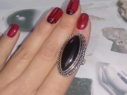 Предлагаем Вам купить красивое кольцо из камня черный оникс.
Размер 18,2.
индийс. . фото 6
