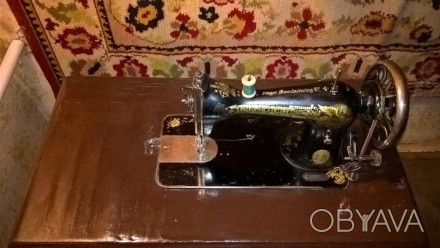 Продается швейная машина SINGER 1911 года на чугунной станине. Состояние рабочее. . фото 1