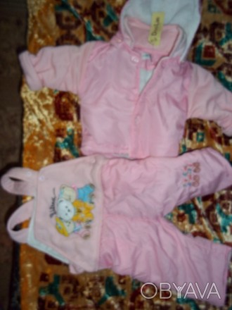 продам новый (с этикеткой) розовый  костюм на новорожденную девочку, длина куртк. . фото 1