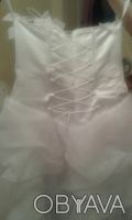 Продам шикарное свадебное платье р.44-48,верх-корсет из атласа на молнии и шнуро. . фото 7