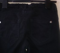 Фирменные черные джинсы Piaza Italia для девочки в хорошем состоянии р.146-152.
. . фото 4
