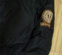 Демисезонная куртка Fishbone. Цвет черный. Много карманов, в том числе на рукаве. . фото 6