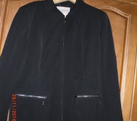 Піджачок чорний може бути курточка. Розмір - 50.
Виробник - Італія
62% акріл, . . фото 2