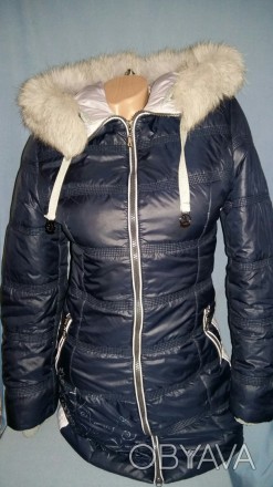 Женская зимняя курточка
На бирке указан размер 44, идет на 42
На капюшоне мех . . фото 1
