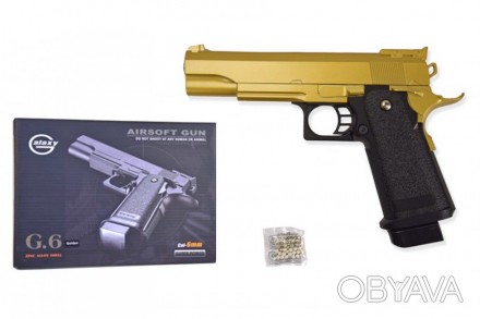 Пістолет метал-пластик G.6GD з кульками в коробці 22*16*3,4 см (шт.). . фото 1