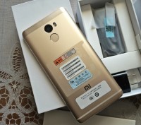 Продам новий,оригінальний телефон"Xiaomi Redmi 4"(з заводу запечатаний,включався. . фото 4