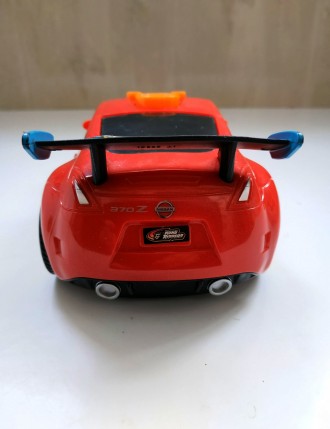 Машинка спортивная электрическая Toy State Nissan 370Z  Road Rippers
Для детей . . фото 8