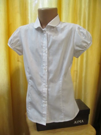 Блуза белая на девочку 8-9 лет , рост 134см. Пог-38, Длина-49см.. . фото 2