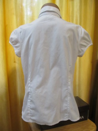 Блуза белая на девочку 8-9 лет , рост 134см. Пог-38, Длина-49см.. . фото 3