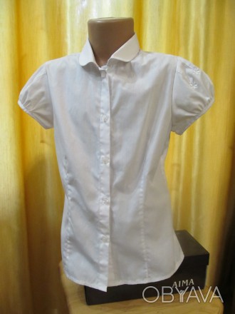 Блуза белая на девочку 8-9 лет , рост 134см. Пог-38, Длина-49см.. . фото 1
