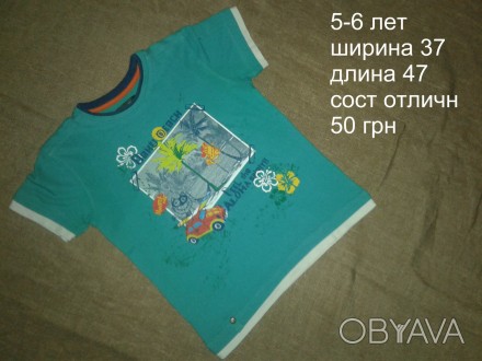 б/у в отличном состоянии зеленая х/б футболка на мальчика 5-6 лет
при заказе от . . фото 1