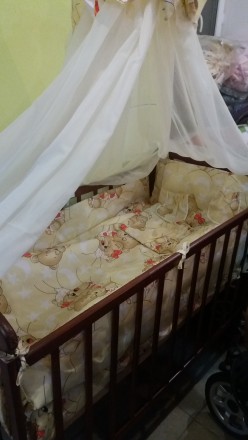 Кроватка Наталка в хорошем состоянии с матрасом и новым комплектом постельного с. . фото 4