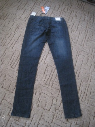 качественные джинсы , на резинке ,без замка, узкие,длина 95см, по поясу  84см , . . фото 3