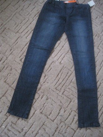 качественные джинсы , на резинке ,без замка, узкие,длина 95см, по поясу  84см , . . фото 2