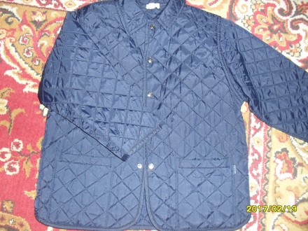 куртка хлопчакова темно синього кольору стьогана дуже легенька 2 накладні кишені. . фото 2