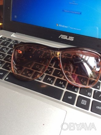 Солнцезащитные очки с коричневой окраской. Пластиковые.. . фото 1