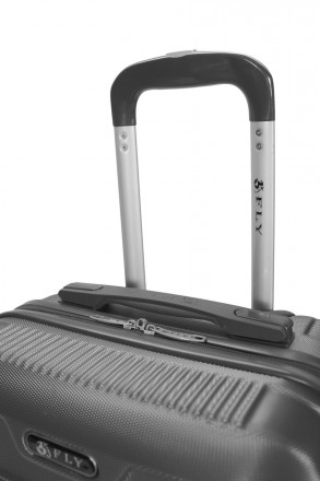 
Среднего размера дорожный пластиковый чемодан Fly 1093 предназначен для длитель. . фото 9