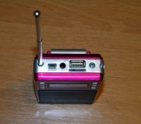 Продам  радіоприймач який в собі вміщує MP3 плеєр, ліхтарик, гніздо для мікро SD. . фото 3