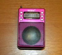 Продам  радіоприймач який в собі вміщує MP3 плеєр, ліхтарик, гніздо для мікро SD. . фото 2