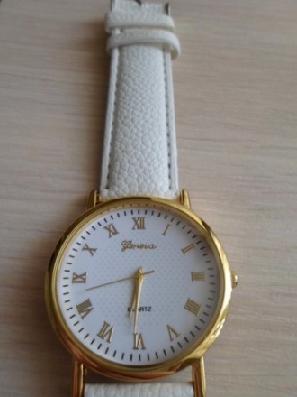 Продам новые часы с ремешком разных цветов. Циферблат с римскими цифрами.. . фото 3