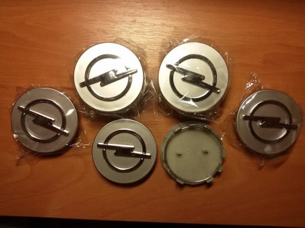 Заглушки (колпачки) для литых дисков OPEL. 
Используются для заводских литых ди. . фото 2