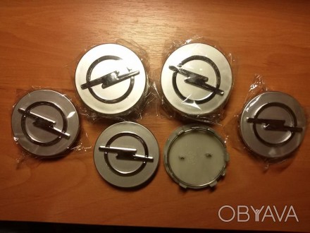 Заглушки (колпачки) для литых дисков OPEL. 
Используются для заводских литых ди. . фото 1