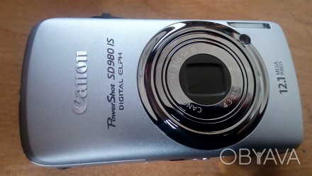 Цифровая фотокамера Canon PowerShot SD990 IS имеет CCD матрицу, с размером 1/1.7. . фото 1
