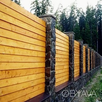  Деревянные заборы и входные ворота отличаются надежностью, простотой и функцион. . фото 1