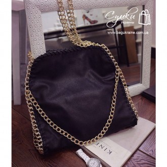 Женская оригинальная сумочка в черном цвете. Она представляет копию сумки Стелла. . фото 2