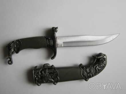 Сувенирный нож 

 Длина изделия-21 см,длина ножа-11 см.
 Материал-сталь,пласт. . фото 1