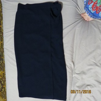 Очень нарядная,длинная юбка синего цвета на подкладке с запахом.Пояс на спине-ре. . фото 2