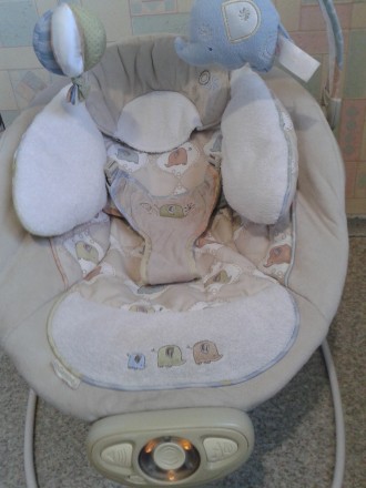 Если Вы устали качать малыша на руках, положите его в электронное кресло-качалку. . фото 6