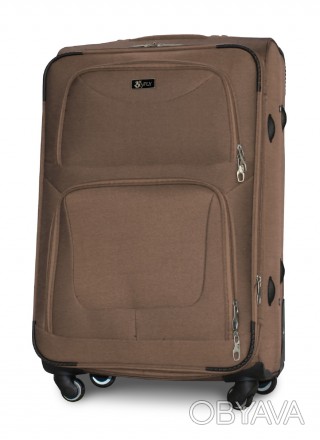 
Средний тканевый чемодан на четырех колесах Fly 1220 изготовлен из надежного и . . фото 1