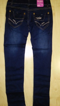 Очень классные зауженные джинсы. 
Состав ткани: 90 % хлопок, 5% полиэстр, 5% эл. . фото 4