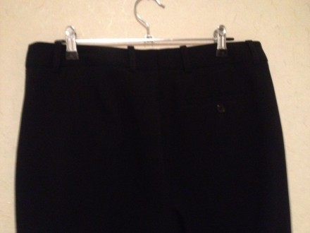 Длинные чёрные брюки H&M
Новые. Не мнутся. Ткань немного тянется.
длина от поя. . фото 4