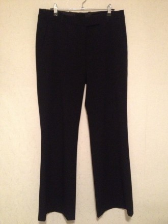 Длинные чёрные брюки H&M
Новые. Не мнутся. Ткань немного тянется.
длина от поя. . фото 6