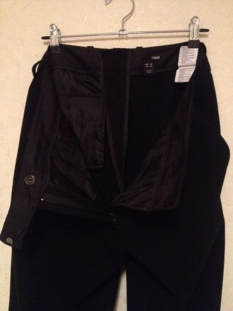 Длинные чёрные брюки H&M
Новые. Не мнутся. Ткань немного тянется.
длина от поя. . фото 10